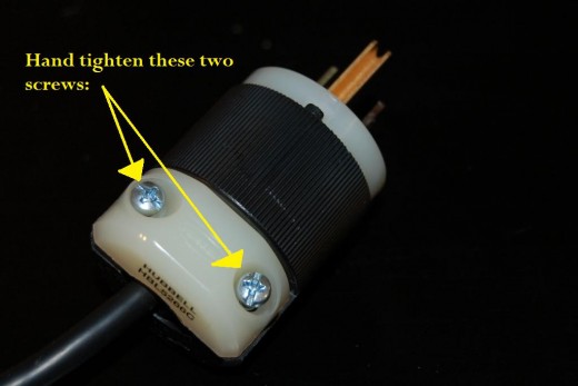 Now tighten up those top two screws so that the wire is secured to the new plug. Now you're almost done... Now tighten up those top two screws so that the wire is secured to the new plug. Now you're almost done...