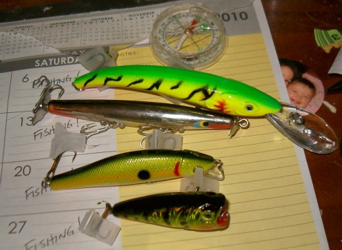 Typical Springtime Bass Lures. The Devil's Horse is second from the top, beneath the firetiger stickbait.