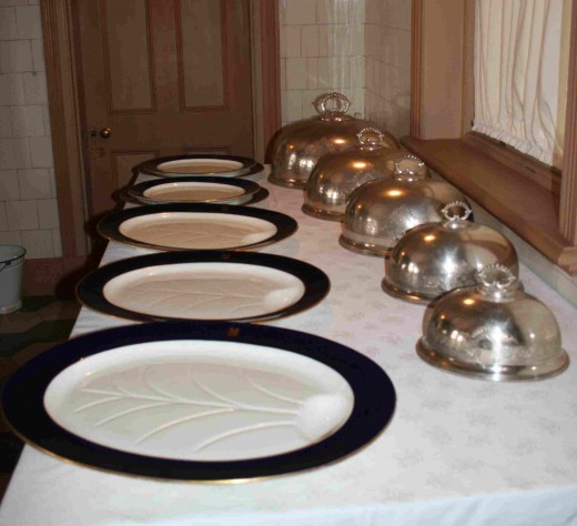 Platters and silver covers in the kitchen