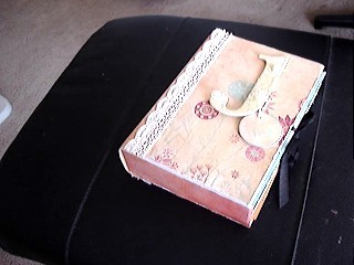 chipboard die cut on cover of chipboard album