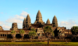 The Angkor Wat temple ruins stand at the center of a UNESCO World Heritage Site in modern Cambodia. Built in the twelfth century, it remains the largest religious building in the world.