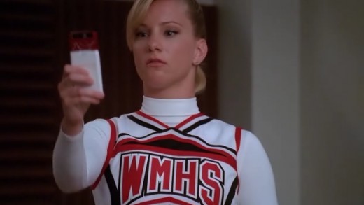 Brittany filming New Directions' choreography during rehearsal