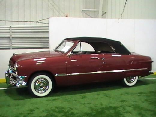 Classics and Chrome Car Show Loves Park Illinois photo of burgundy convertible with black top