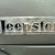 classic silver Jeepster chrome emblem
