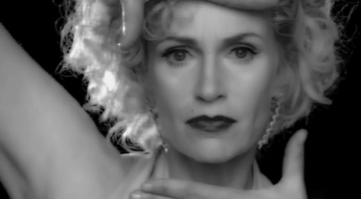 Sue starring in a music video of Madonna's "Vogue"