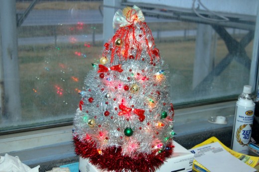 Someone was in the holiday spirit at work and brought in this tiny Christmas tree.  