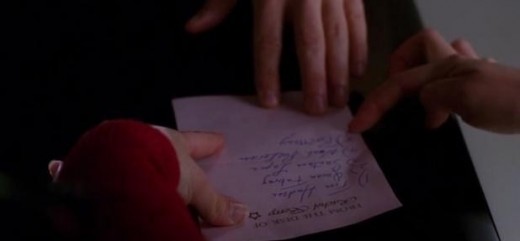 Rachel handing Will a list of the Glee members who were bluffing their way through rehearsal.