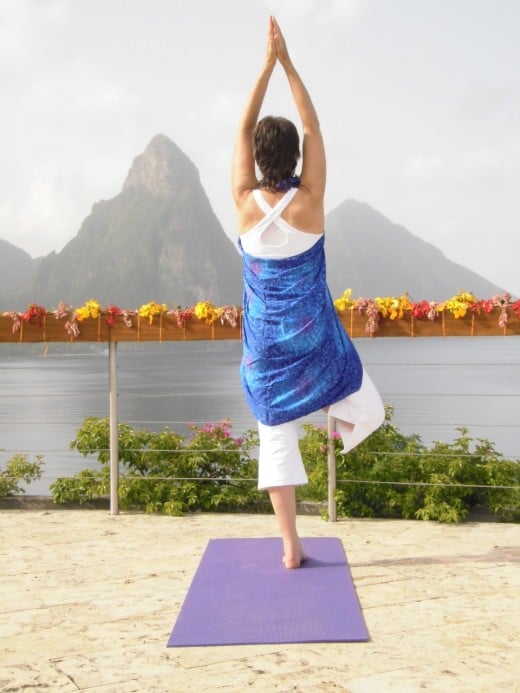 Morning yoga on the Celestial Terrace above the Pitons and Soufriere, St Lucia:  tree posture, sea and mountain