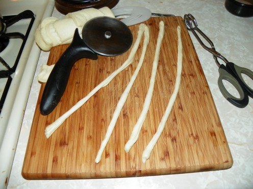Bread stick Churros require cutting bread stick dough in half lengthwise twisting them and frying them makes some of the fastest Churros around.  
