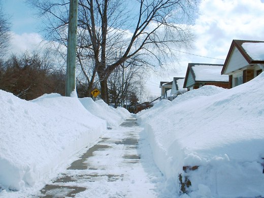 The snow piled high on many a street