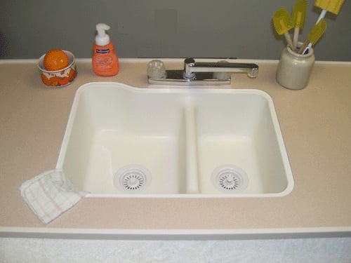 Kitchen double sink is smaller than your normal size home double sink.