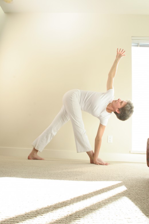 Revolving triangle twists, stretches legs, and develops balance.