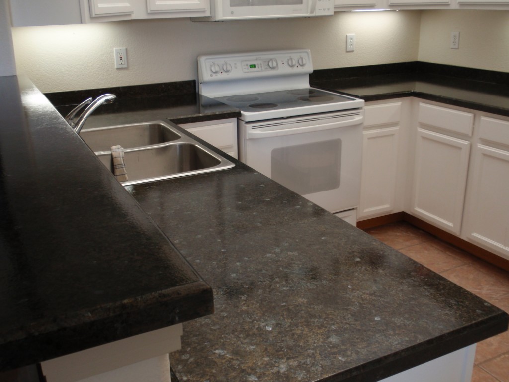 Refinish your laminate countertop to look like granite.