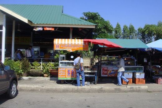  I purchased 4 apples for 40 baht (a little more than a US dollar) on one of my trips.  The picture doesn't show the two monks dressed in typical orange robes that were eating in the open air restaurant area