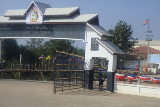 A portion of the big gateway into Cambodia that we were directed away from and re-directed thru that metal cattle corral-affair. 