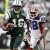 New York Jets' Brad Smith, left, carries the ball for a first down while pursued by Buffalo Bills' Leodis McKelvin during the first quarter of an NFL football game at New Meadowlands Stadium, Sunday, Jan. 2, 2011, in East Rutherford, N.J. (AP Photo/K