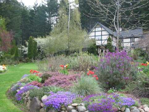 Liatris and heather in the purple border surround the putting green for visiting golfers at this hotel near Victoria, Canada.