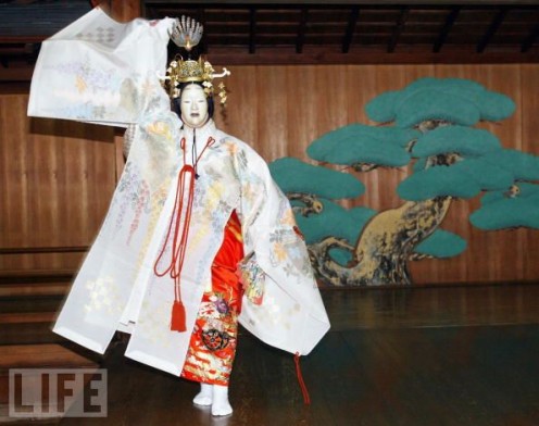 Saraguka Dancer. Face covered by Mask.