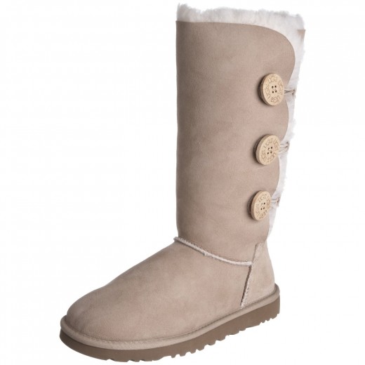 UGG Bailey Button boots shown in sand.
