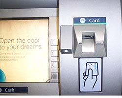 ATM with skimming reader attached