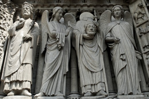 Saint Denis, Bishop of Paris, holds his head up high even after being beheaded