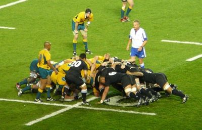 The All Blacks and Wallabies contest a rugby union scrum
