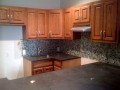 Save Money By Refinishing Your Own Kitchen Cabinets
