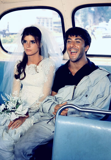 Katharine Ross and Dustin Hoffman, in The Graduate, make their getaway on a local bus