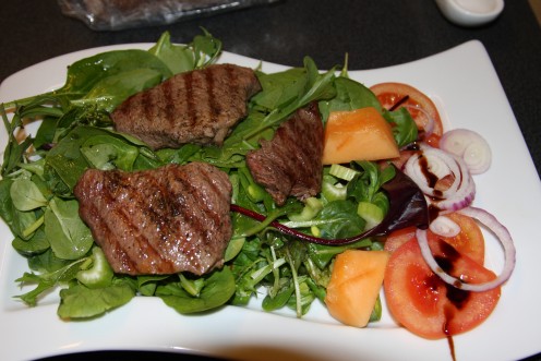This was just fantastic. Steak with mixed salad a little galiano melon, tomato and a touch of balsamic,oil cream.