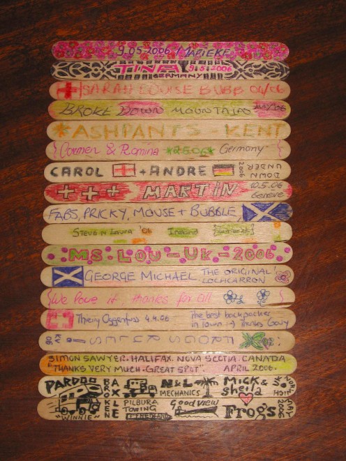 Travellers leave their mark at Frog's by writing on a lolly stick - our message (bottom) takes up two sticks.