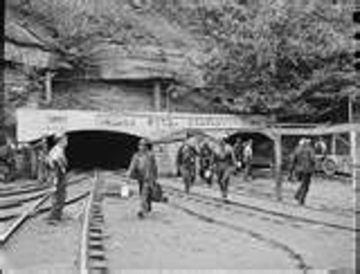 Miners working the mine portal in Wheelwright