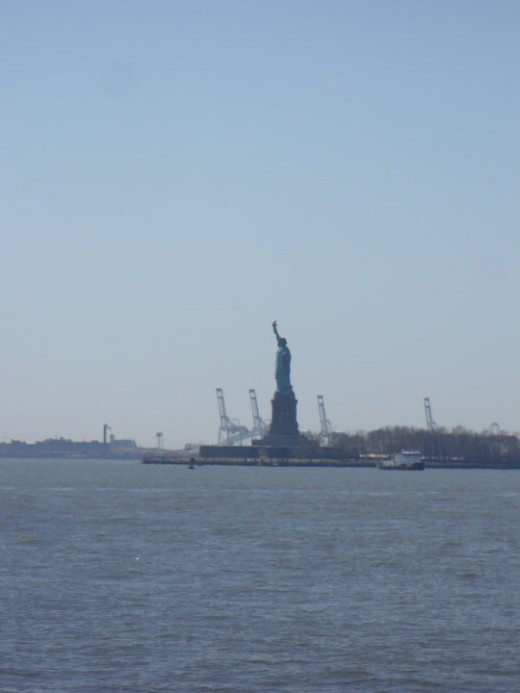 The Statue of Liberty from Battery Park, Lower Manhattan, NYC