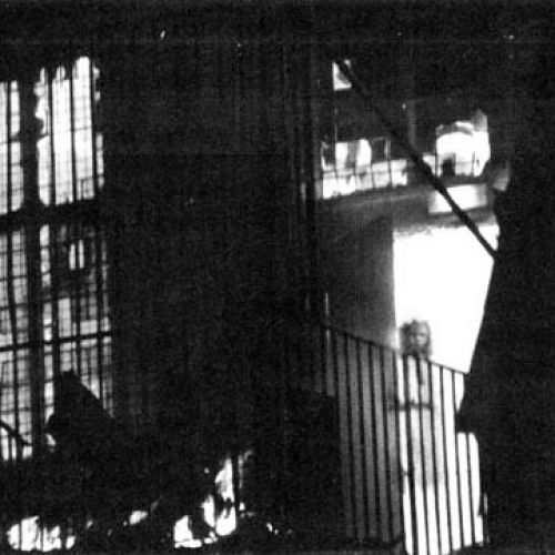 The classic photo of the girl ghost in the burning building. Was she the physical representitive of the flames that ravaged the building.