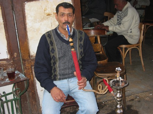 Another hooka smoker in a street cafe