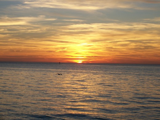 Here, the breathtaking beauty of the Chesapeake Bay is captured on the northern end of the Chesapeake Bay Bridge and Tunnel at sunset in Virginia.