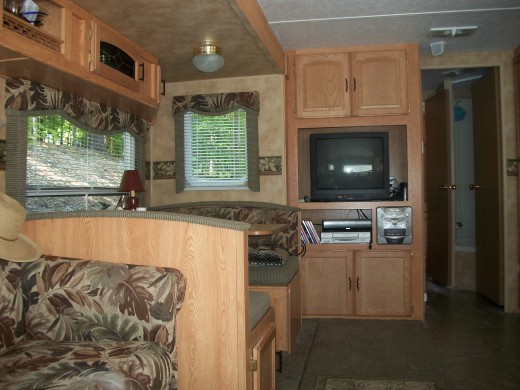 View into bathroom/tub/shower