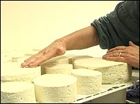 hand salting the cheese