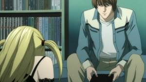 Misa gives Light her love and her death note.