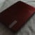 The nice sleek shine on my red Packard Bell notebook.