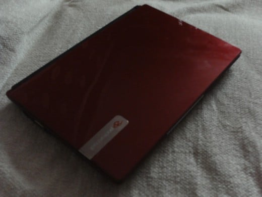 The nice sleek shine on my red Packard Bell notebook.