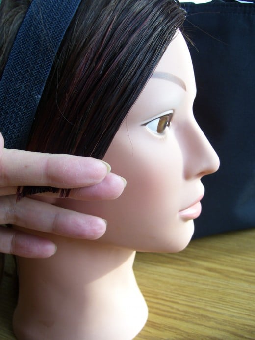 Fringe cut but held in place still.