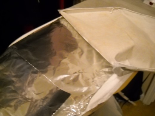 Aluminium foil under iron board cover.