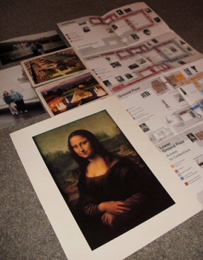 My Louvre souvenirs - a map, postcards, pictures of my best friend and I outside the Louvre, and a Mona Lisa print I bought in the Louvre gift shop