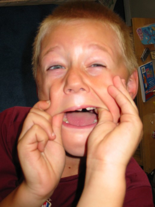 Get the kids to make a silly face as one of the forfeits in 'pass the parcel'