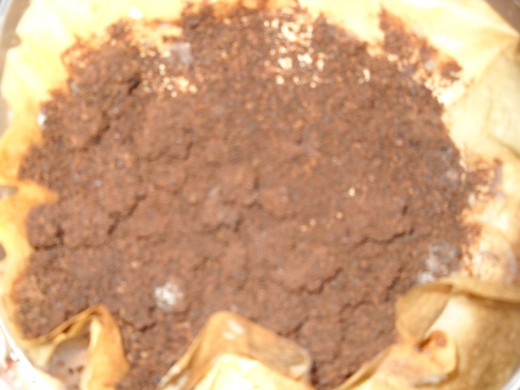 Dry used coffee grounds.