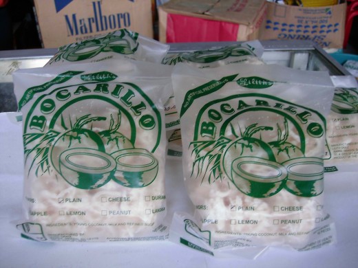 BOCARILLO - version of Bokayo or sweetened young coconut. For Bocarillo, the producer added milk and used refined white sugar as sweetener. It comes in a variety of flavors: plain, cheese, durian, apple, lemon, peanut and langka.