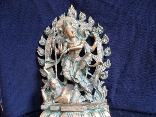 Shiva dancing on the demon