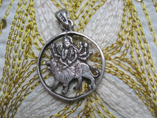 Marie-Belle chose this lovely silver medallion of Durga to wear on her hike in the Himalayas.