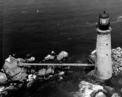 The Graves Light, Boston Harbor in the Public Domain.  This reminds me of part of the movie, and is in the same general area where the island might have been located.