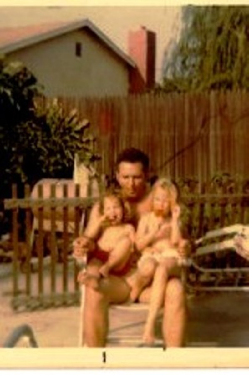 Dad sharing a Popsicle break with my sister and I on a hot summer day in the early 1970's 